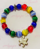 Autism Awareness Silver Puzzle Charm Bracelet - Cat’s Eye