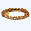 Gold Carrousels Script Bracelet